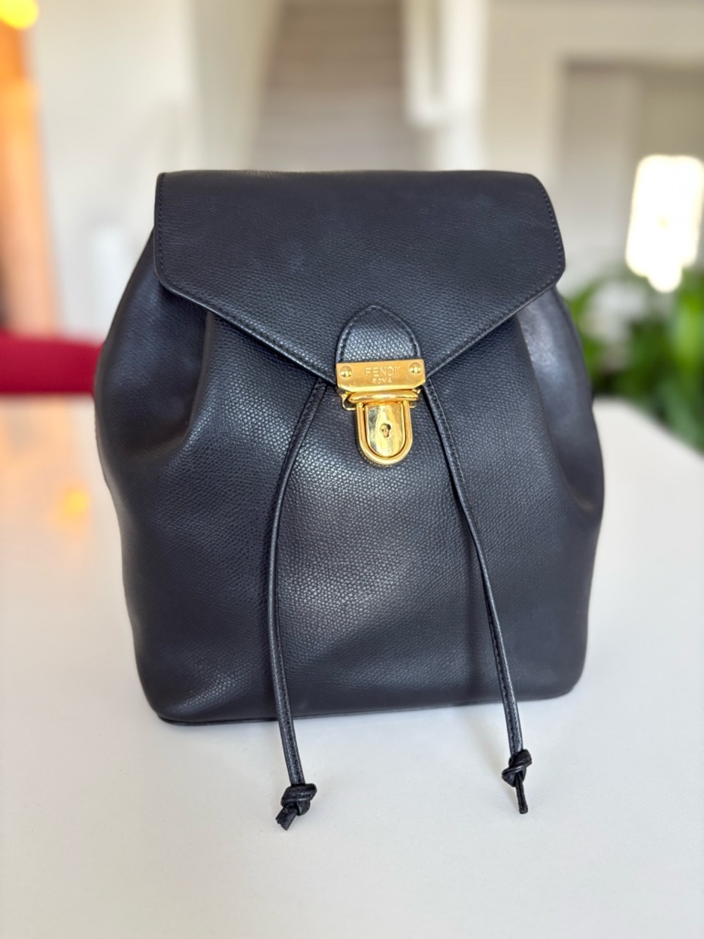 Fendi Black Leather Drawstring Backpack with Gold-Tone Lock
